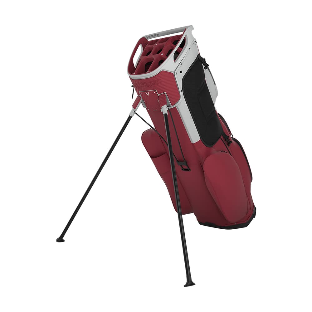 A dark red Callaway Fairway 14 stand bag, legs out, on white