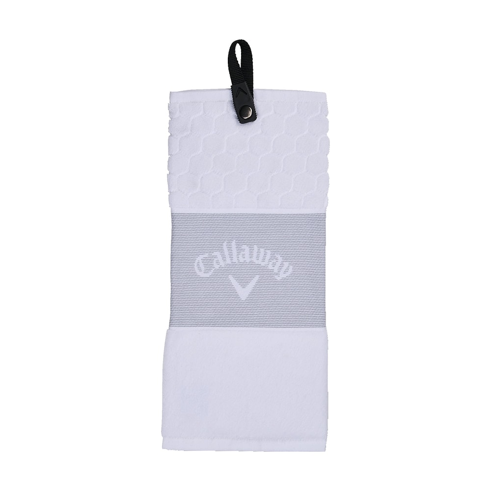 A white Callaway trifold golf towel, on white