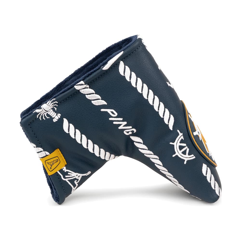 A navy Ping Captain's blade putter cover, on white