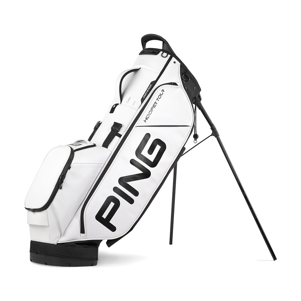 A Ping Hoofer Tour stand bag in white and black, on white